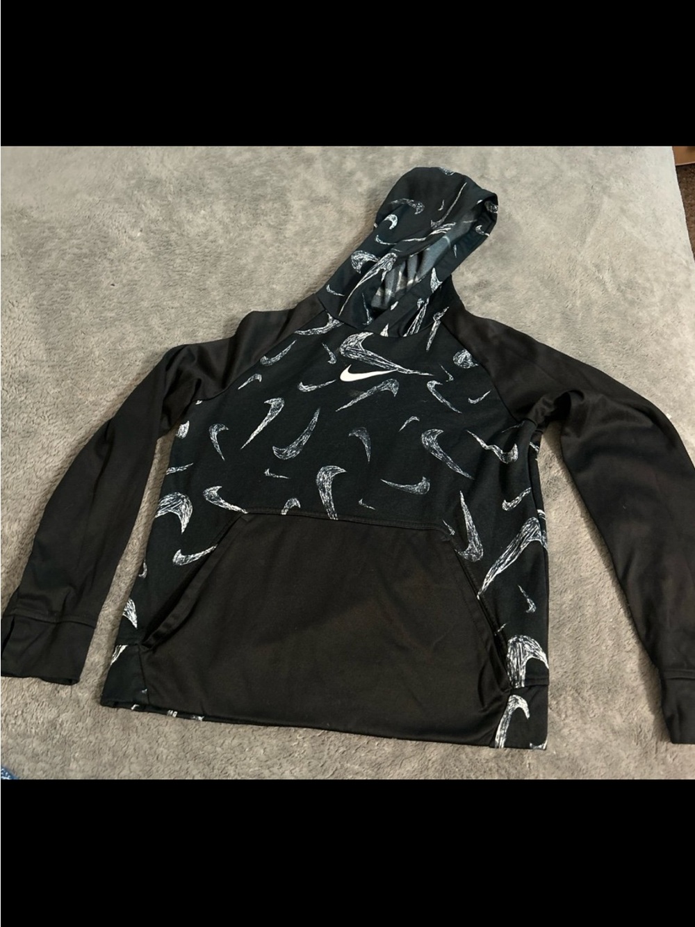 Nike Black Hoodie with White Swoosh Pattern